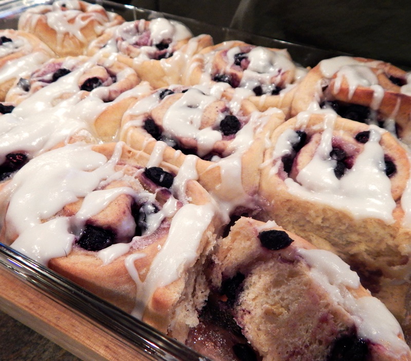 These tender, zesty blueberry breakfast buns are a tasty twist on traditional cinnamon rolls complete with lemony icing. Dairy-free recipe.