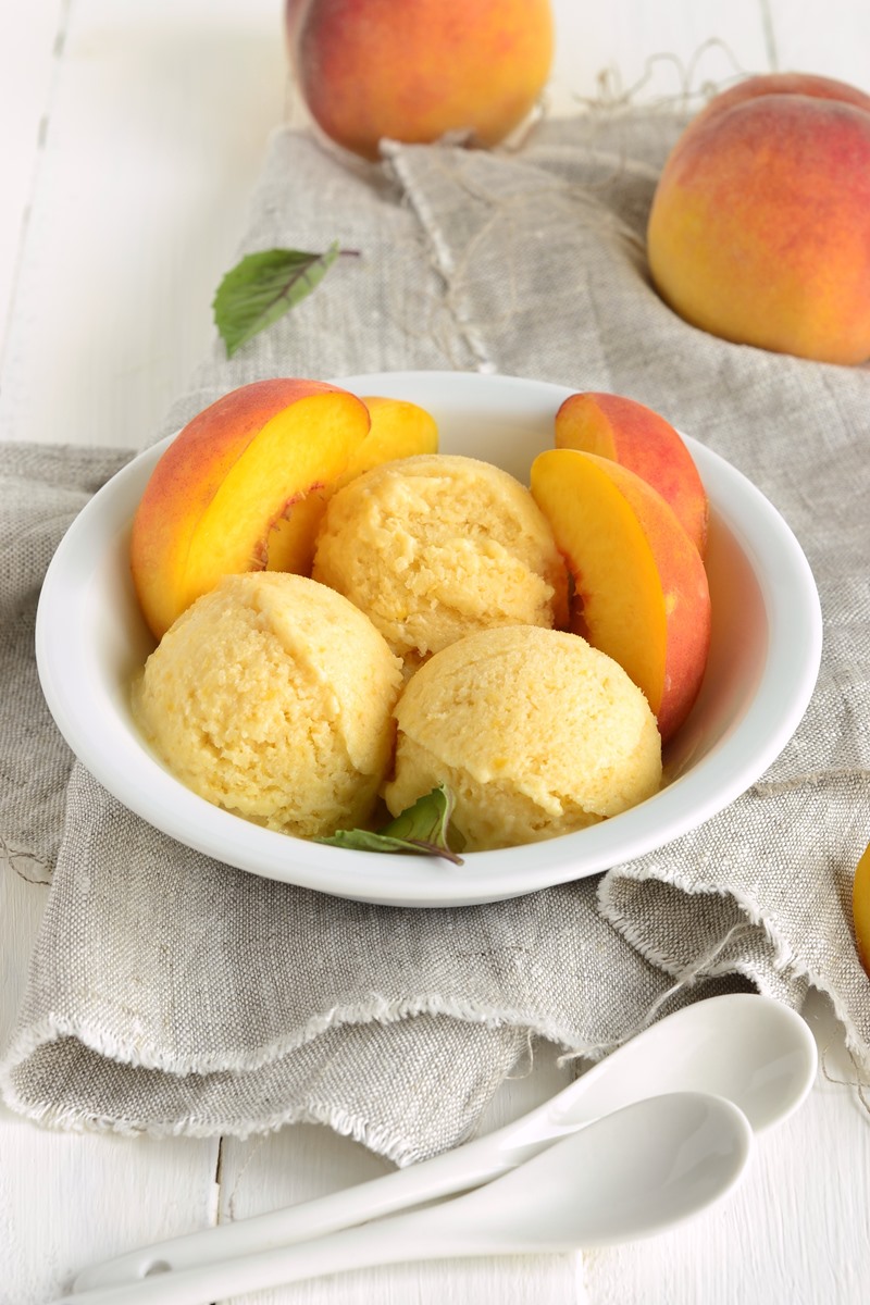 Plant-Based Peach Ice Cream Recipe that's Ready in an Instant. Dairy-free, gluten-free, soy-free, nut-free, vegan nice cream with various options.
