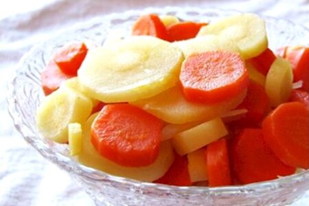 Golden Carrot and Parsnip Coins for Health and Prosperity - Lightly glazed recipe to bring out the natural sweetness of the vegetables. Dairy-free, gluten-free, plant-based, allergy-friendly.