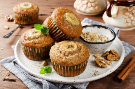 Whole Wheat Banana Muffins Recipe with Cinnamon and Raisins. Dairy-free, nut-free, and soy-free with gluten-free and vegan options.