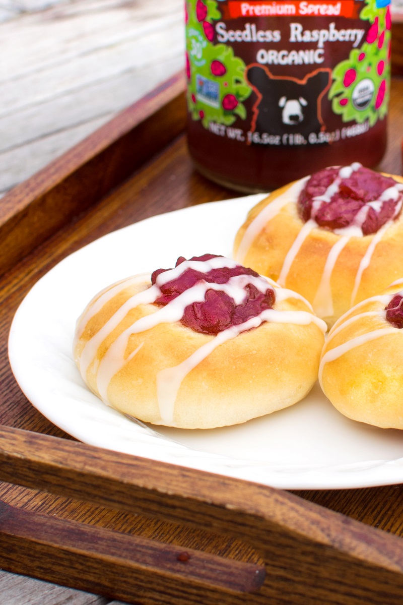 Raspberry Breakfast Buns Recipe - dairy-free, nut-free, soy-free rolls with a jam "thumbprint" and icing drizzle. Great for breakfast or afternoon tea! Can make egg-free and vegan.