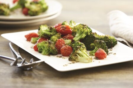 Garlic Roasted Broccoli and Tomatoes - delicious caramelized vegetables paired with basil, oregano and white wine vinegar