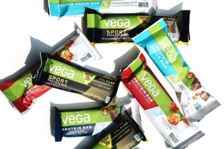 Vega Protein Bars in Snack, 20g, and Sport Varieties. Reviews, ingredients, availability, etc. All vegan, gluten-free, and dairy-free. Pictured: Variety