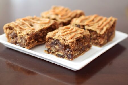 Perfectly Peanut Butter Oatmeal Bars Recipe - naturally vegan, gluten-free and nutritious treat (spiked with cinnamon and raisins)