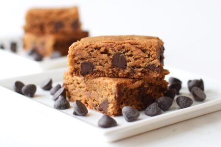 Wholesome Chocolate Chip Cookie Bars - Gluten-Free, Dairy-Free, Vegan, and Free of Top Allergens. They're also made without refined sweeteners and with ancient grains!