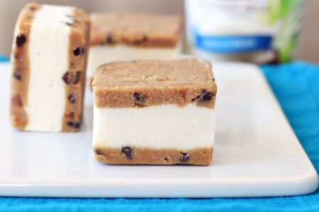 Cookie Dough Ice Cream Sandwiches - Dairy-Free Vanilla Bean Frozen Dessert sandwiched between Vegan Chocolate Chip Cookie Dough for over-the-top indulgence!