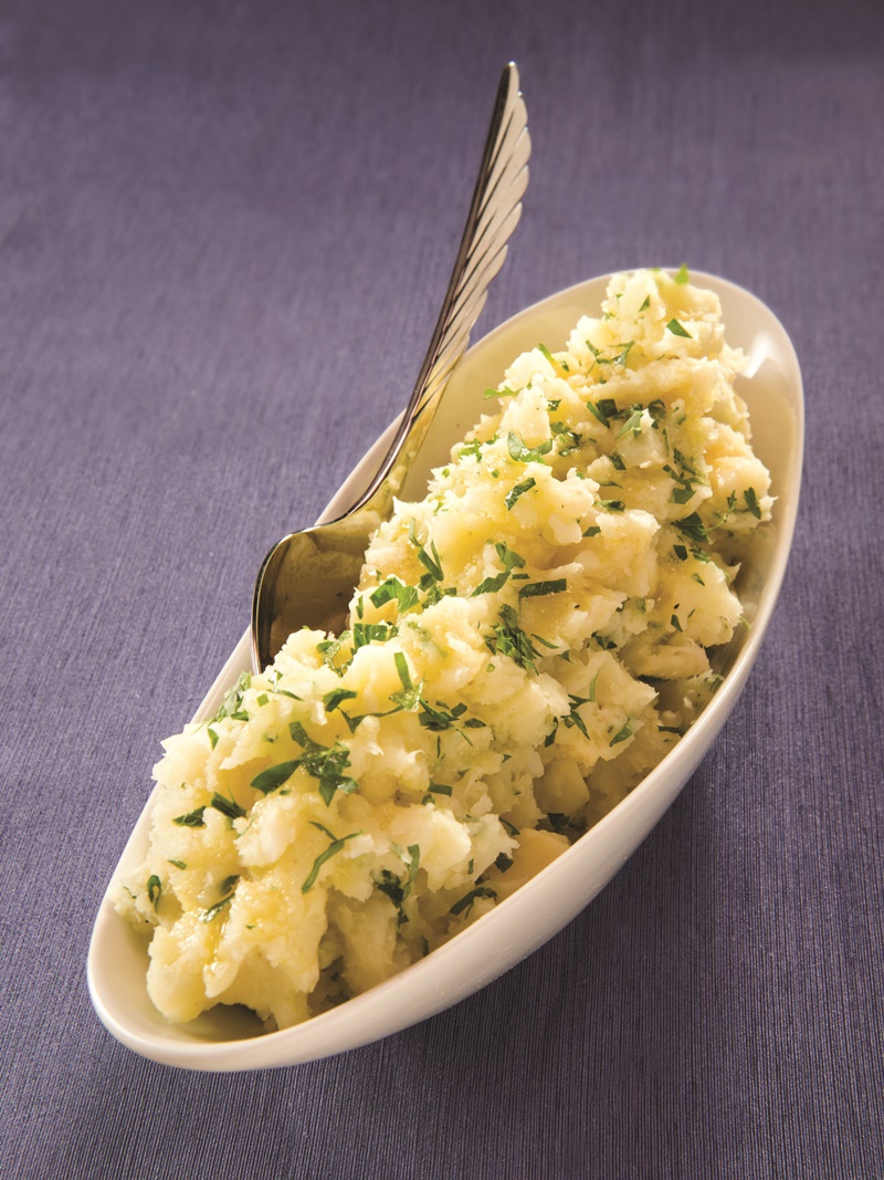 These amazing smashed potatoes are spiked with lightly sweet parsnips and enriched with an easy, homemade garlic olive oil. Vegan, gluten-free recipe. Perfect for Thanksgiving, Easter or your everyday dinner rotation!