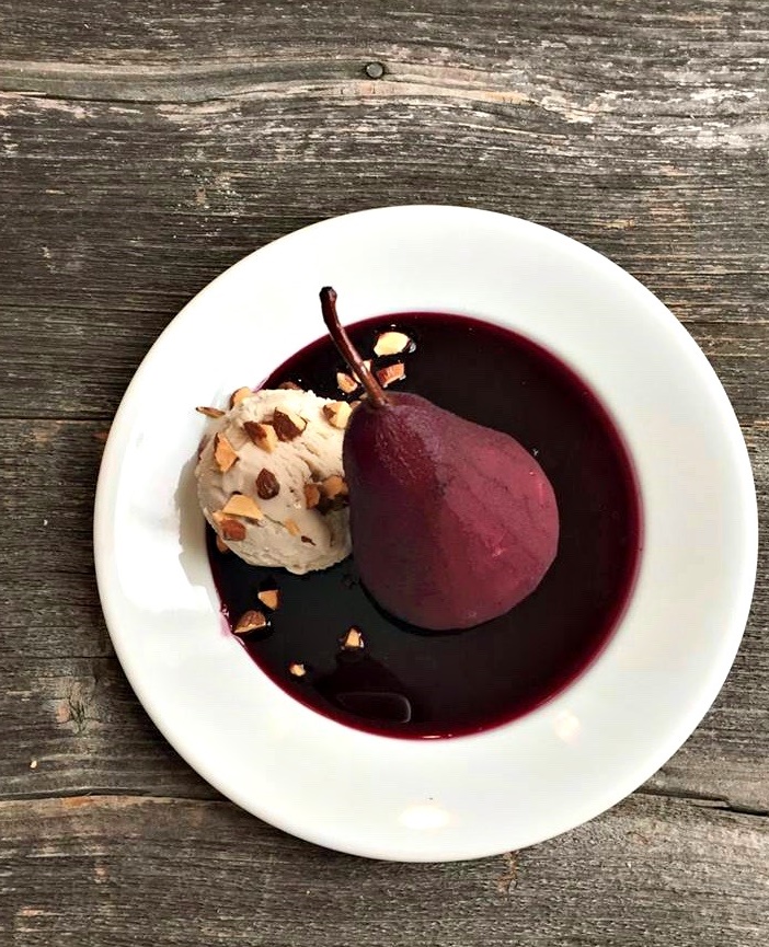 Shiraz Poached Pears with Almond Vanilla Ice Cream, an elegant yet easy gluten-free, dairy-free dessert by Chef Jackie Ourman.