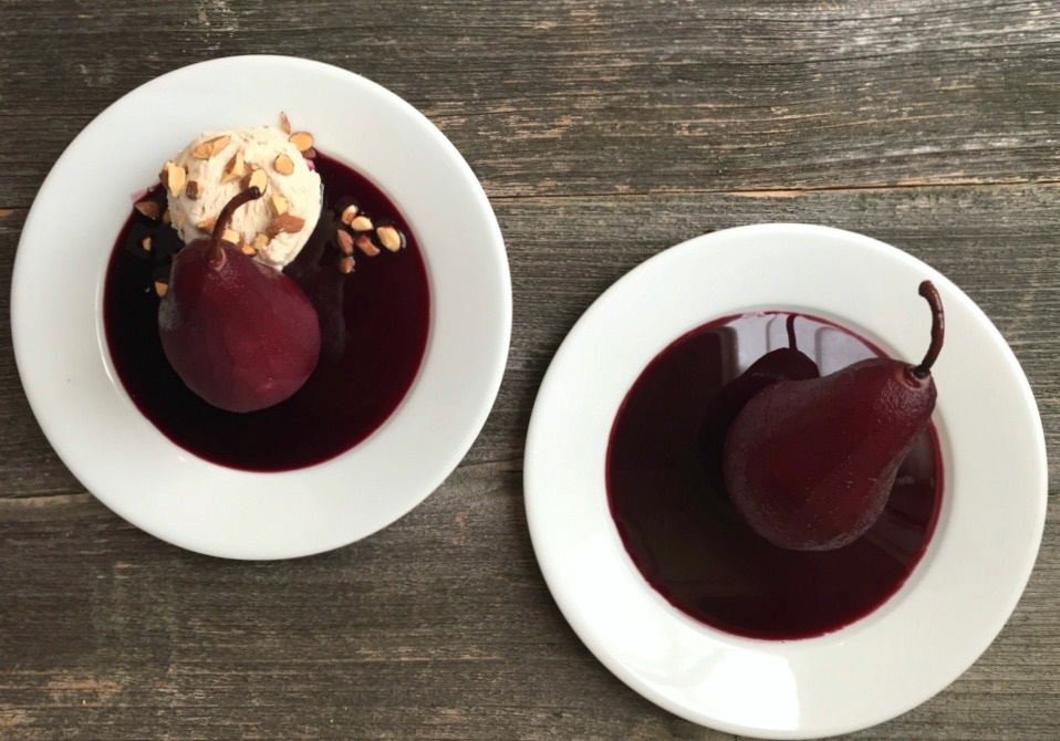 Shiraz Poached Pears with Almond Vanilla Ice Cream, an elegant yet easy gluten-free, dairy-free dessert by Chef Jackie Ourman.