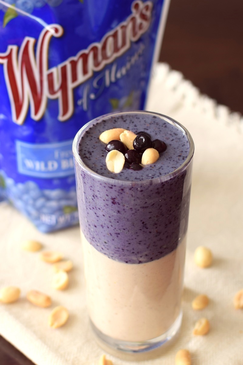 Perfect Peanut Butter and Jelly Smoothie Recipe! The delicious, nutritious layers are SO easy to make. Vegan, gluten-free, soy-free. @wymansfruit #SpringIntoSmoothies