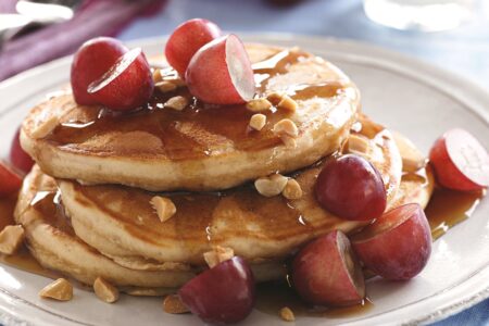 Cheater Peanut Butter Pancakes Recipe - PB and J inspired stack using pancake mix, PB powder, and fresh grapes!