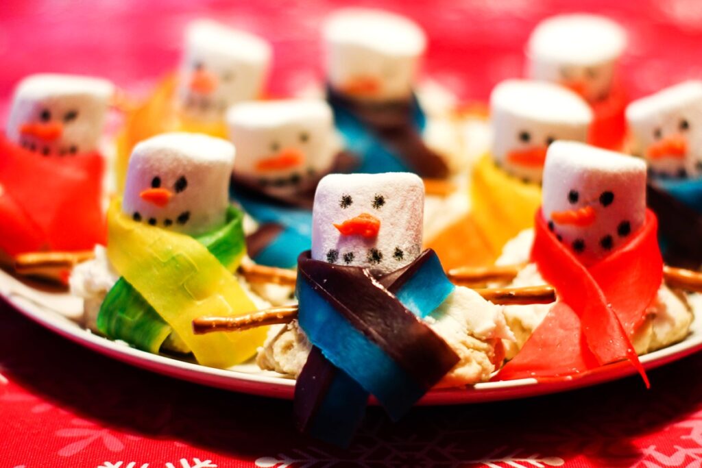 Dairy-free Melting Snowman Cookies Recipe - with homemade vegan vanilla icing and the decorations. Also nut-free & optionally soy-free.