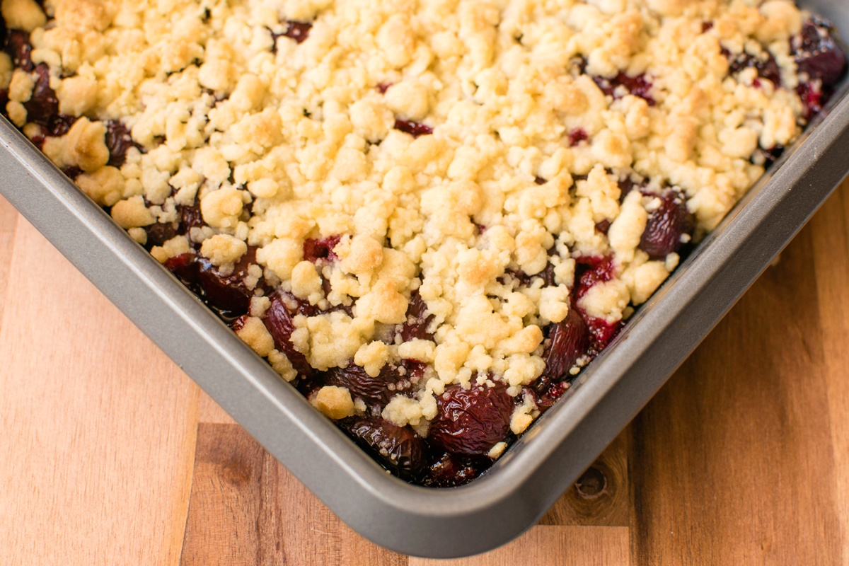 Dairy-Free Fresh Cherry Crisp Recipe - made with a buttery vegan crumble topping. Includes oat-free and oat options