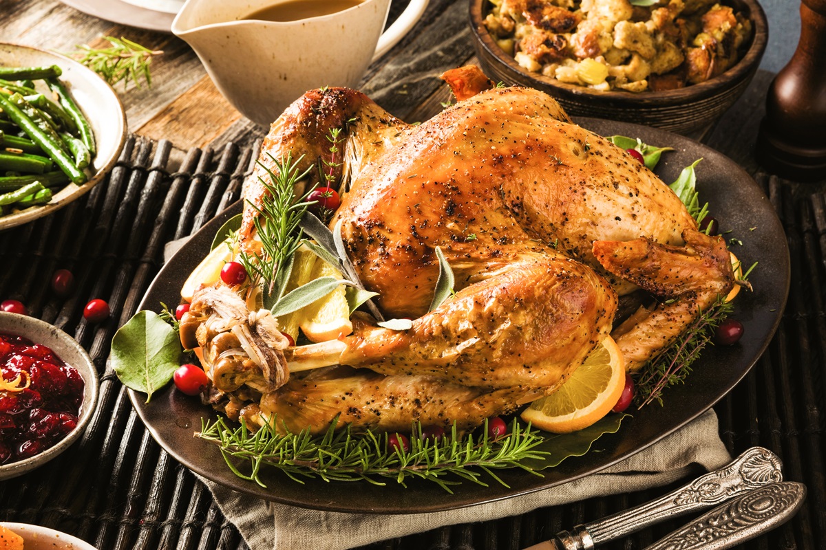 Holiday Brined Turkey Recipe with White Wine, Shallots, and Cranberries. Naturally dairy-fee, gluten-free, top allergen-free, and paleo-friendly.
