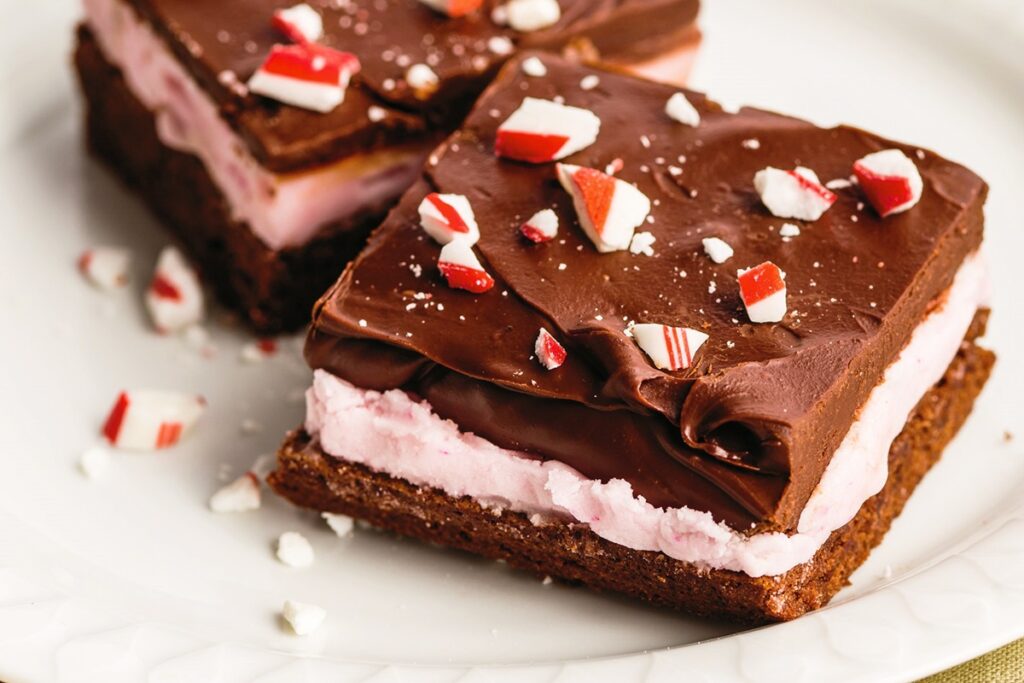 Dairy-Free Chocolate Peppermint Bars Recipe - Triple layer treats with a brownie base, peppermint filling, chocolate ganache, and candy sprinkles on top! Nut-free and soy-free. Gluten-free and vegan options.