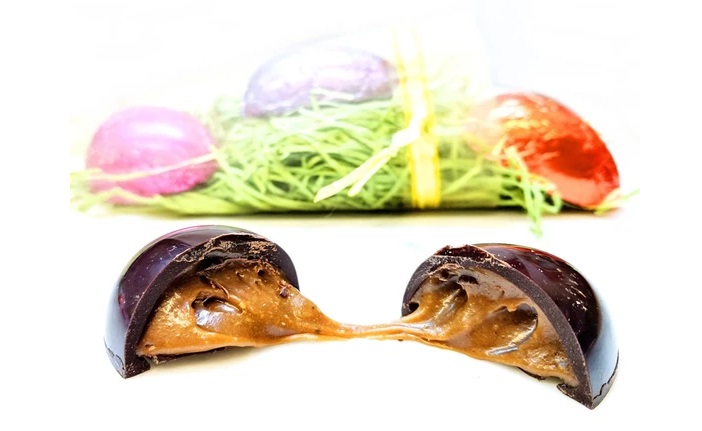 Dairy-Free and Vegan Alternatives to Cadbury Creme Eggs, including chocolate eggs with various cream fillings. US, Canada, UK, Europe, and Australian options! Pictured: Coracao Paleo Chocolate Filled Eggs