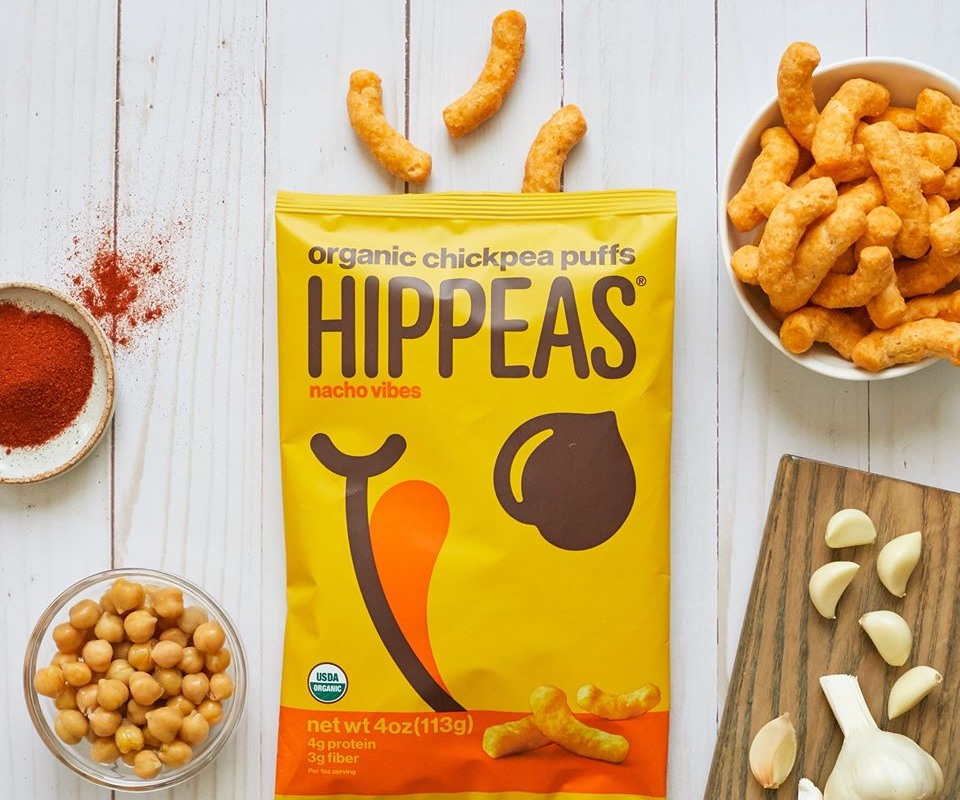 The Best Crunchy Cheesy Dairy-Free Snacks - from crackers to chips, puffs to popcorn, and more! Vegan, Gluten-Free, and Grain-Free Options. Pictured: Hippeas Nacho Chickpea Puffs