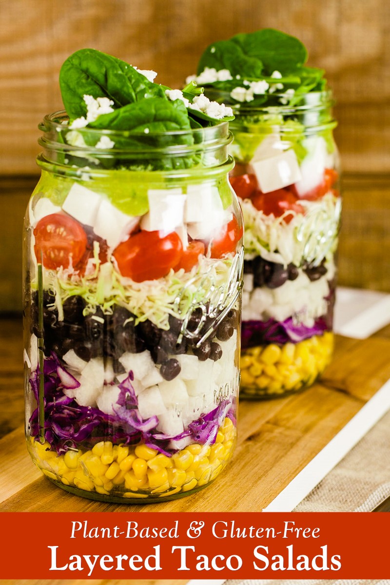 Plant-Based Layered Taco Salads Recipe with Easy Cilantro-Lime Avocado Dressing. Dairy-free, gluten-free, nut-free, vegan.