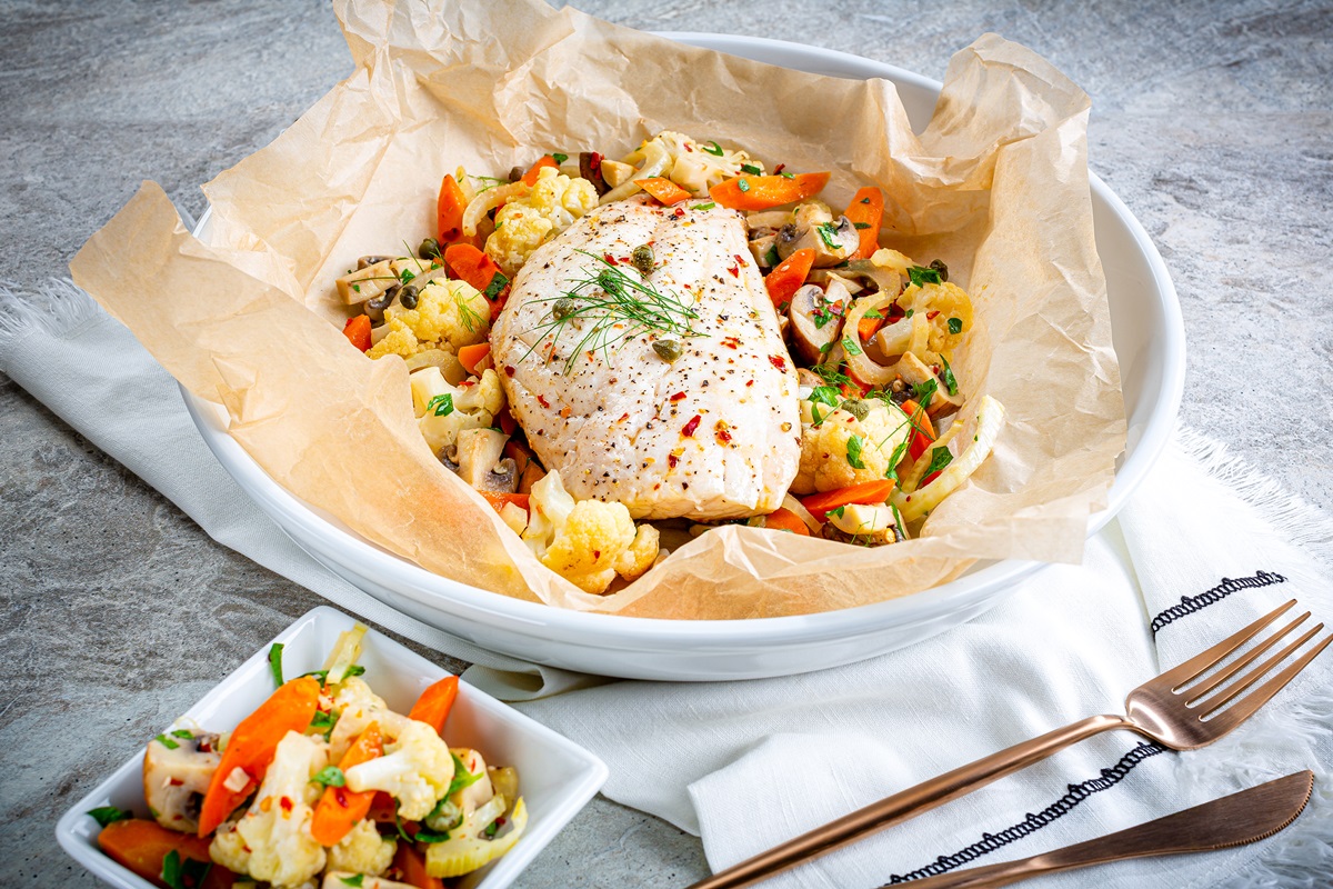Parisienne Snapper with Vegetables is Deliciously Simple Fish En Papillote (in Parchment!). Healthy and Naturally dairy-free, gluten-free, grain-free, egg-free, nut-free, and paleo-friendly. Works great with chicken too!