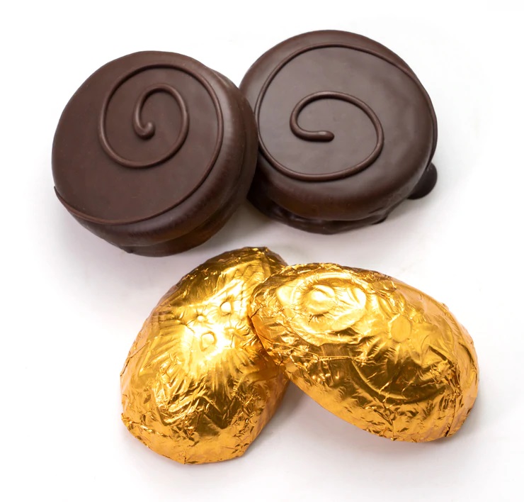 Dairy-Free and Vegan Alternatives to Cadbury Creme Eggs, including chocolate eggs with various cream fillings. US, Canada, UK, Europe, and Australian options! Pictured: Sweet Designs Peanut Butter Eggs