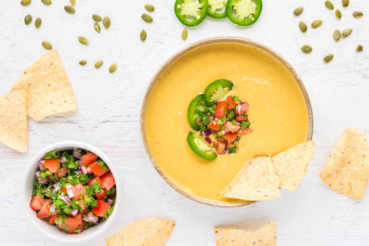 Dairy-free, allergy-friendly, and truly plant-based queso recipe - nut-free, soy-free, gluten-free, grain-free, sesame-free, vegan, and even oil-free.  Excerpt from Dreena's Kind Kitchen cookbook