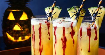 This Bloody Good Pineapple Punch is a Bubbling Brew for All Ages - Great Allergy-Friendly, Kid-Friendly, Plant-Based Halloween Drink. Sparkling Fresh Pineapple Ginger with Cranberry "Blood"