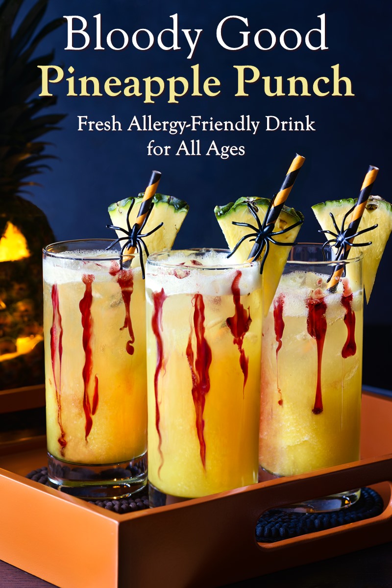 This Bloody Good Pineapple Punch is a Bubbling Brew for All Ages - Great Allergy-Friendly, Kid-Friendly, Plant-Based Halloween Drink. Sparkling Fresh Pineapple Ginger with Cranberry "Blood"