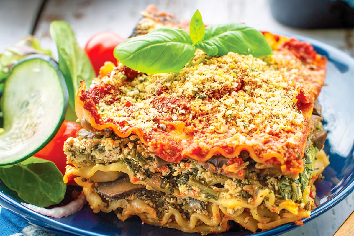 Plant-Based Chef AJ's Gluten-Free Vegan Lasagna Recipe - a sample recipe from the 10th anniversary edition of Unprocessed.  Dairy-free, oil-free and optionally nut-free