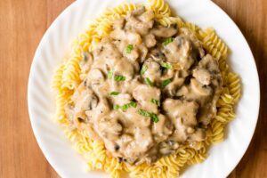 Classic Dairy-Free Beef Stroganoff Recipe - which sour cream alternative is best? What about homemade? What cut of meat should I use? We have all of the answers and your perfect any night recipe! Comforting, creamy, delicious.