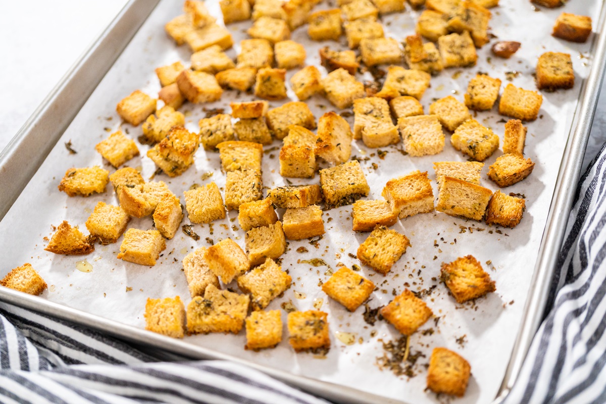 Dairy-Free Croutons Recipe - perfectly seasoned, easy, no waste, and versatile! Takes minutes to prep, uses up bread, can be gluten-free and allergy-friendly, too!