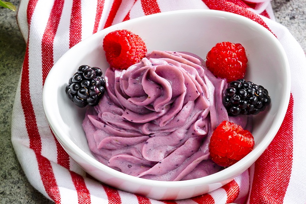 Berry Dole Whip Recipe - homemade version of the iconic dairy-free soft serve sold at Disney parks. Healthy recipe that's naturally allergy-friendly and plant-based.