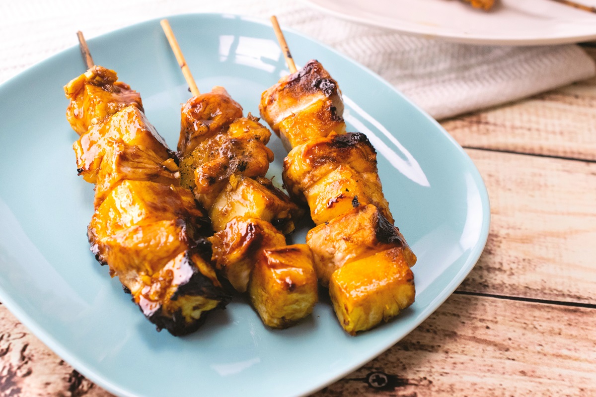 Naturally Dairy-Free Huli Huli Chicken Recipe - Skewers or chicken thighs. Healthy, easy, grilled, with oven baked options.